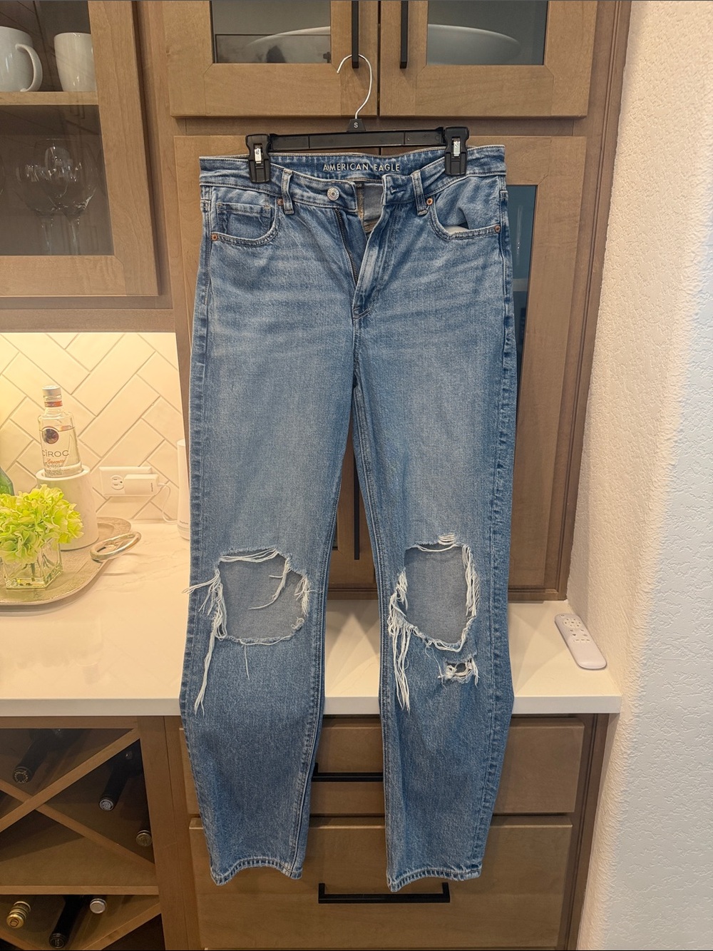 American Eagle Outfitters Light Blue High-Rise Distressed Mom Jeans